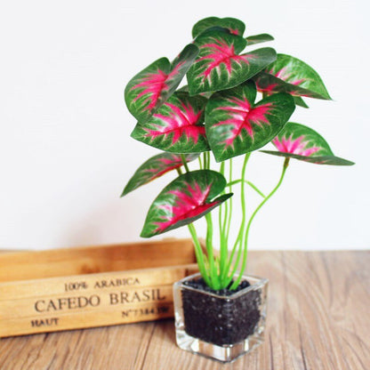 A compact flowerpot in a glass vase